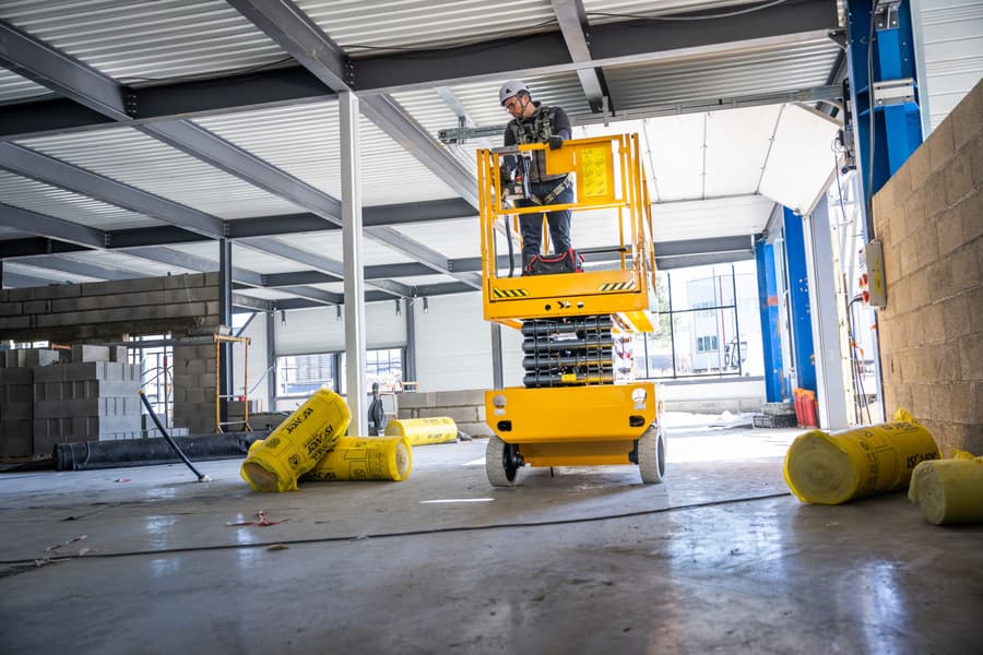 Haulotte Compact 10, platformă foarfecă de 10,1 m